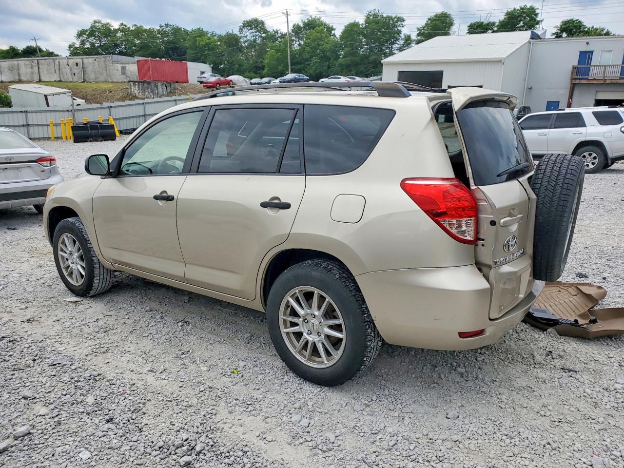 2007 Toyota Rav4 Base Gold vin: JTMBD33V676033985