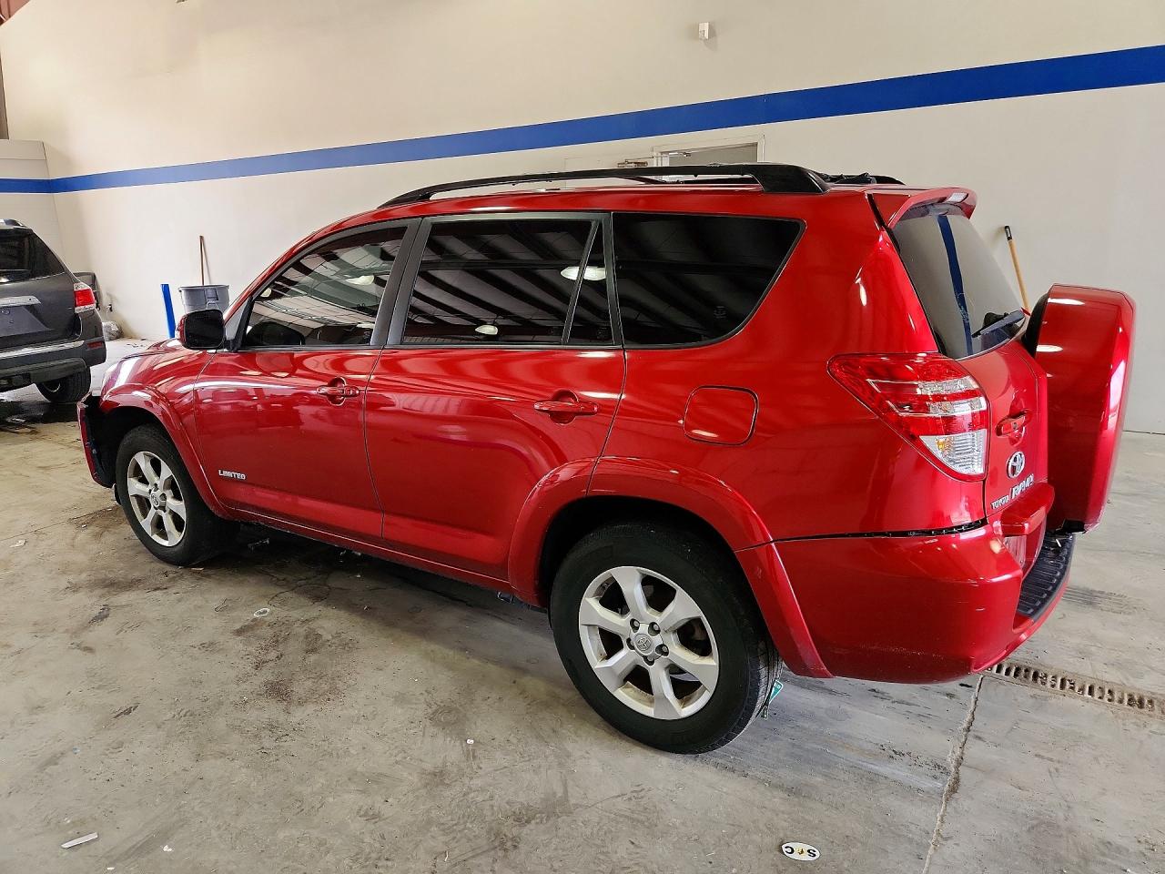 2009 Toyota Rav4 Limited Red vin: JTMBF31V39D000812