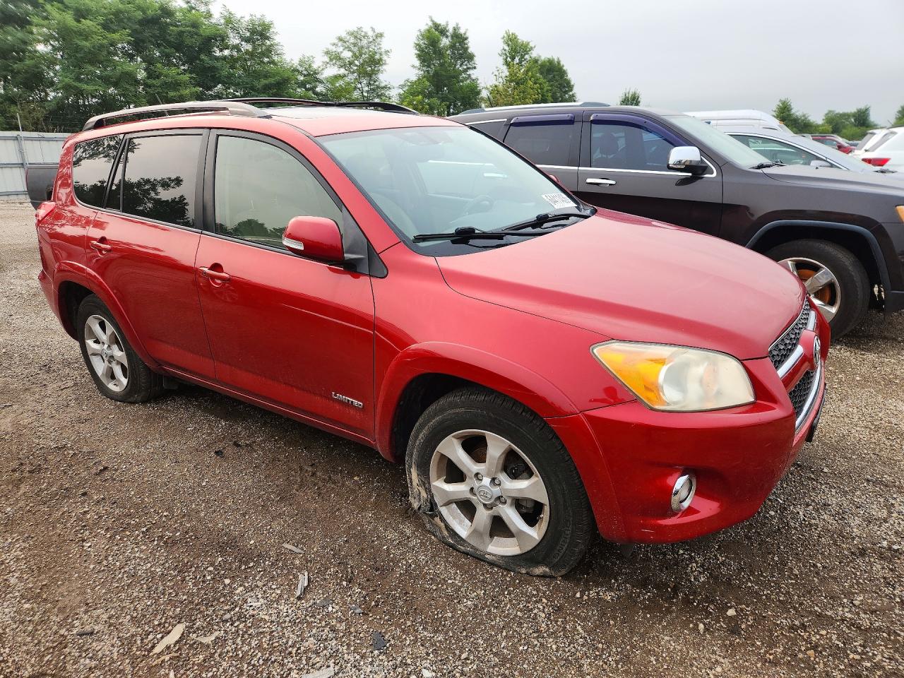 2009 Toyota Rav4 Limited Red vin: JTMBF31V99D000930