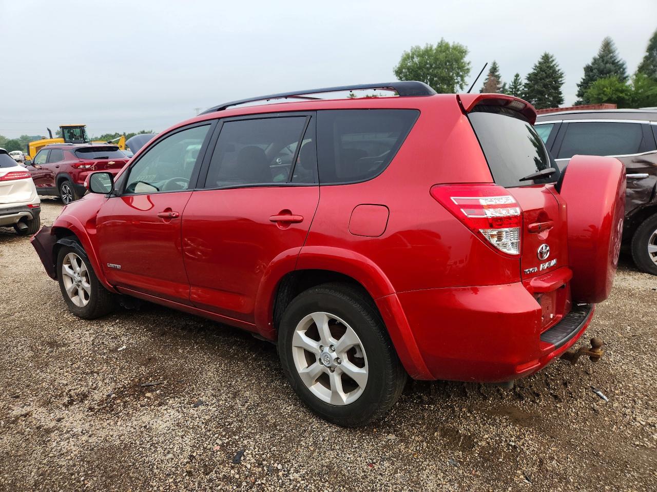 2009 Toyota Rav4 Limited Red vin: JTMBF31V99D000930