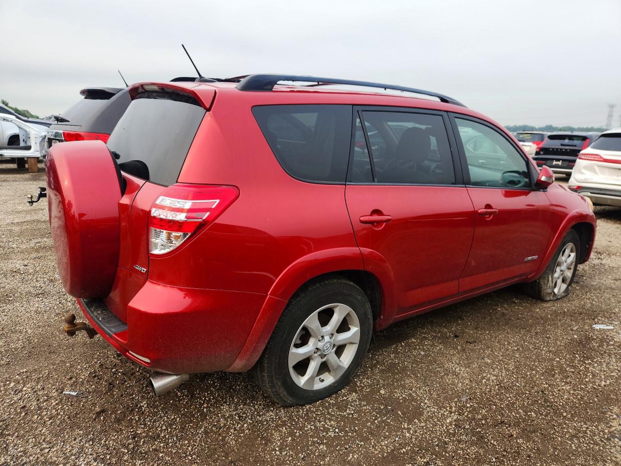 2009 Toyota Rav4 Limited Red vin: JTMBF31V99D000930