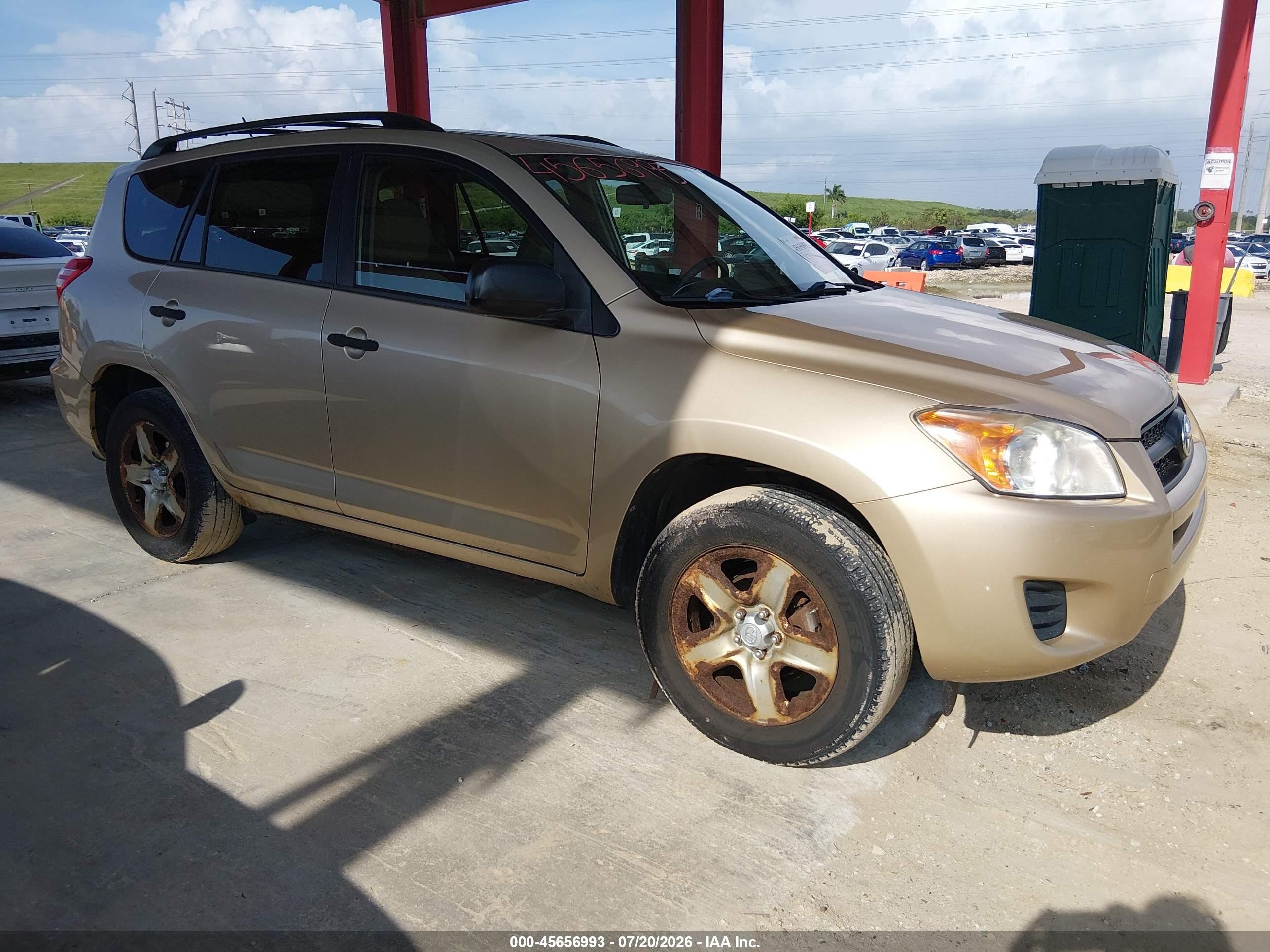 2009 Toyota Rav4   Champagne vin: JTMBF33V09D015958