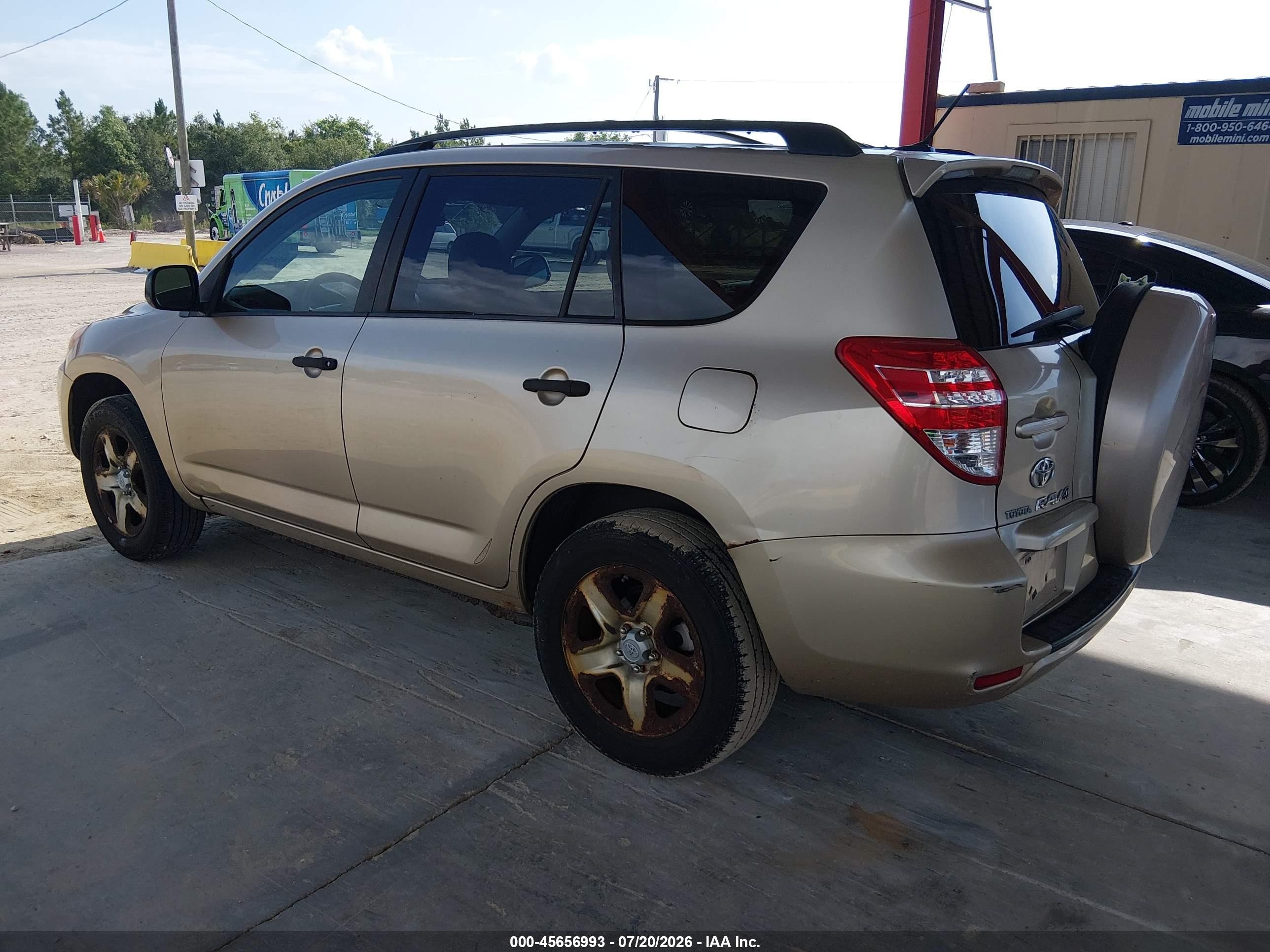 2009 Toyota Rav4   Champagne vin: JTMBF33V09D015958