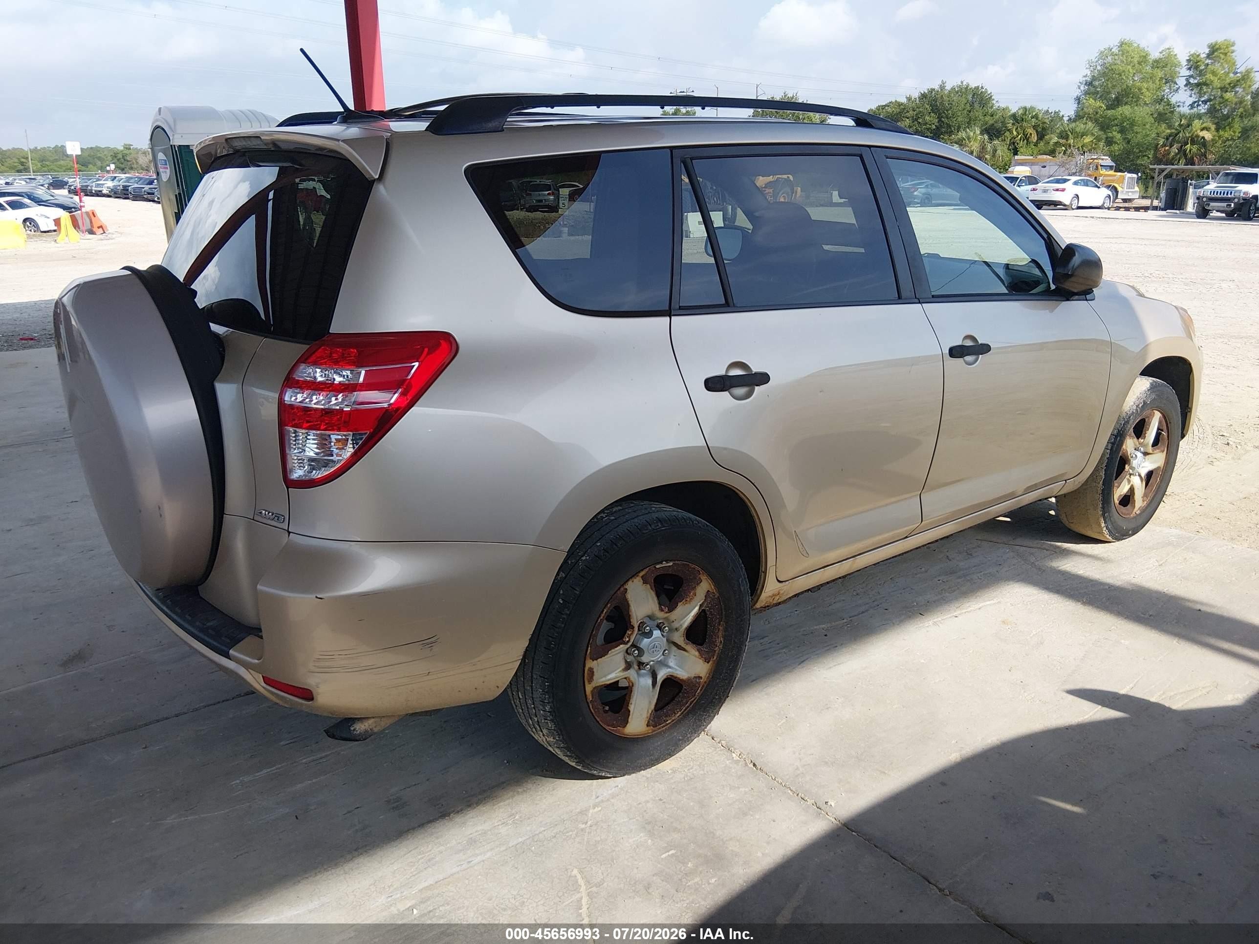 2009 Toyota Rav4   Champagne vin: JTMBF33V09D015958