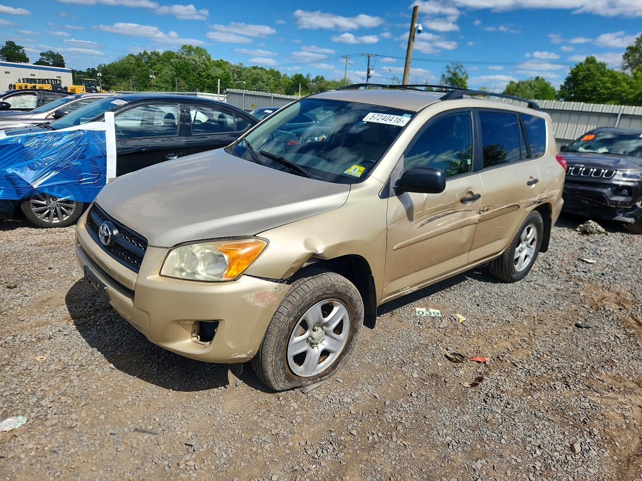 2009 Toyota Rav4 Base Gold vin: JTMBF33V195006390