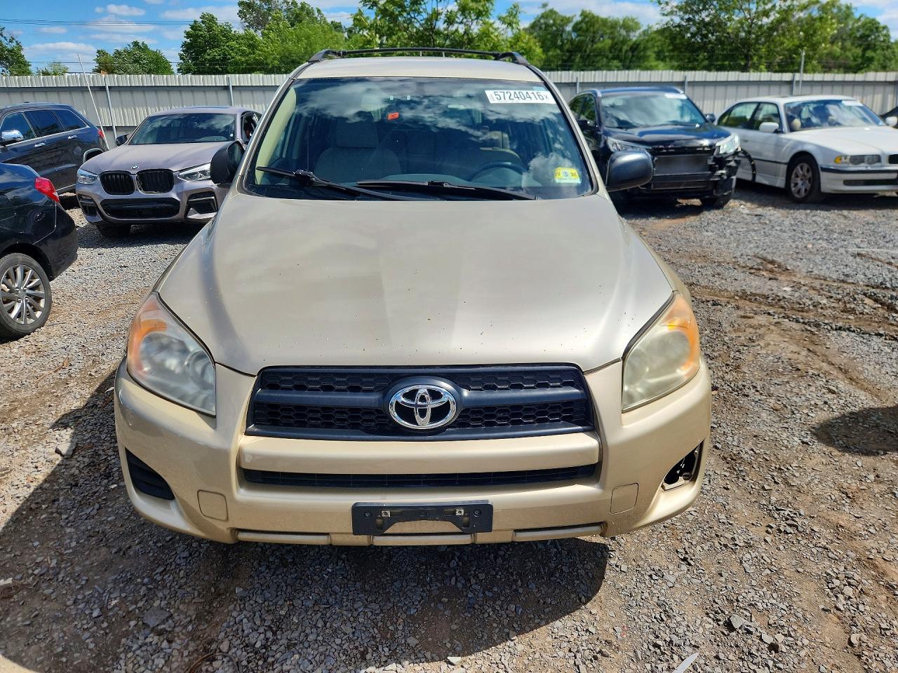 2009 Toyota Rav4 Base Gold vin: JTMBF33V195006390