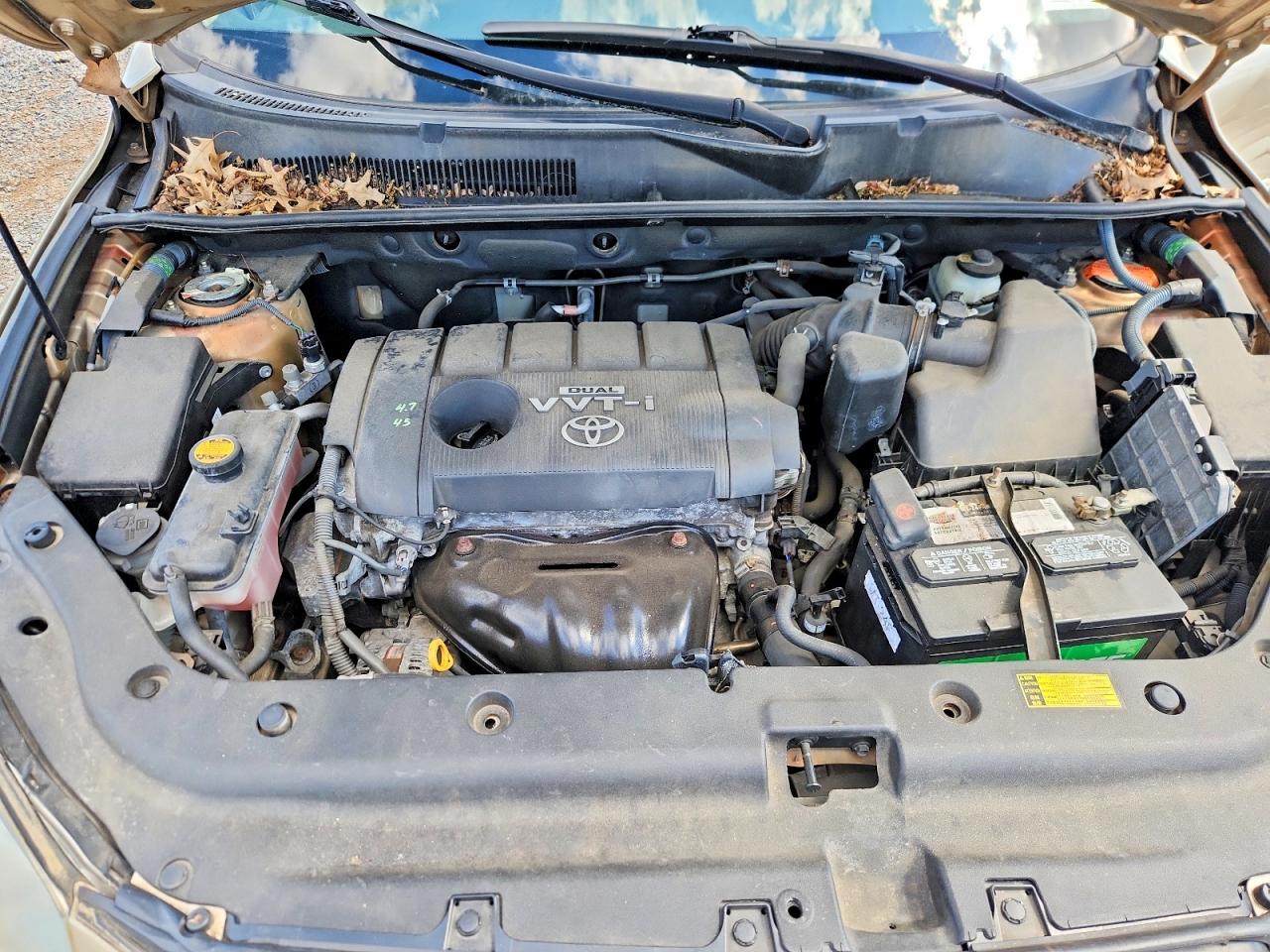 2009 Toyota Rav4 Base Gold vin: JTMBF33V195006390