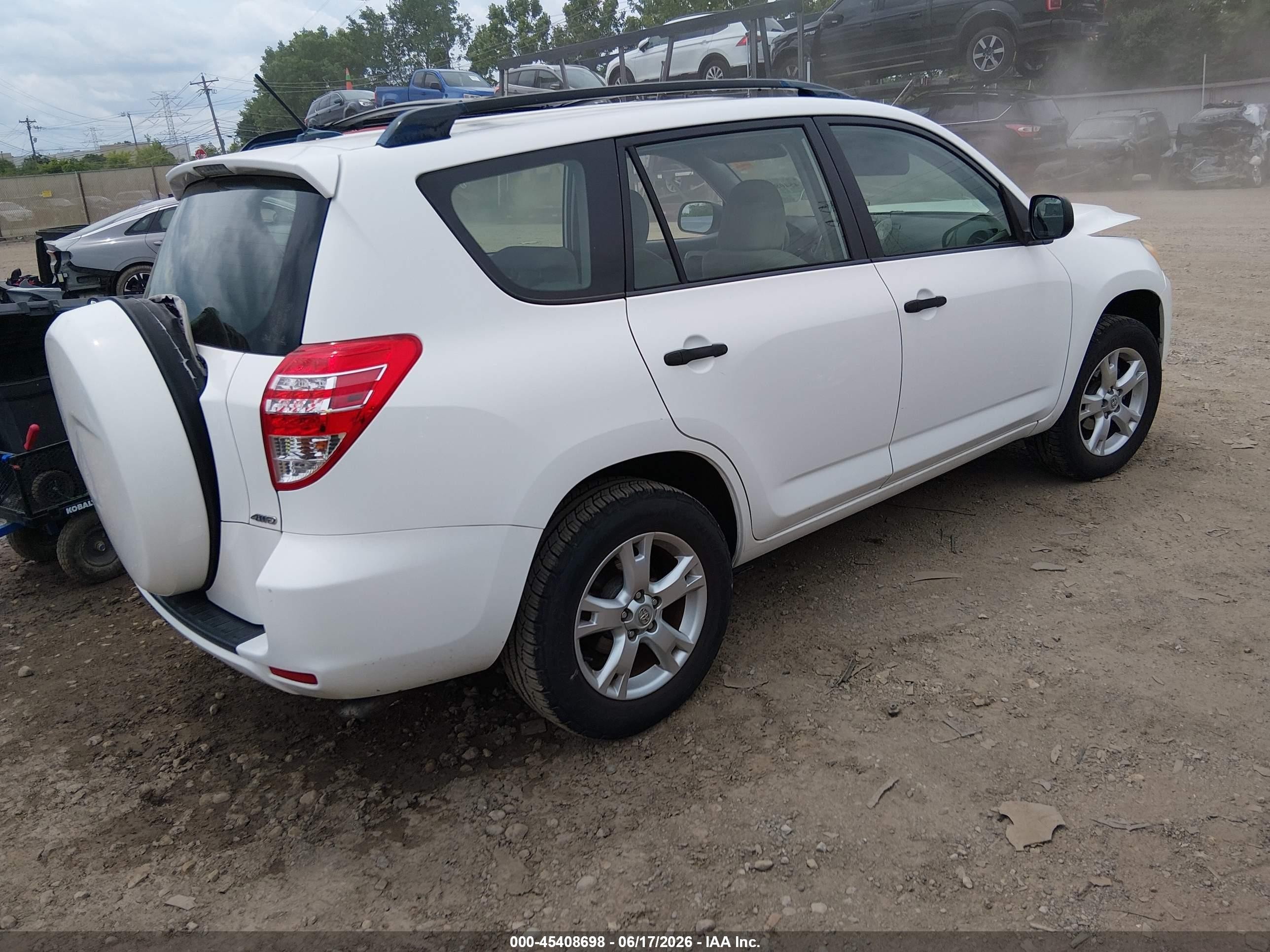 2009 Toyota Rav4   White vin: JTMBF33V19D011966
