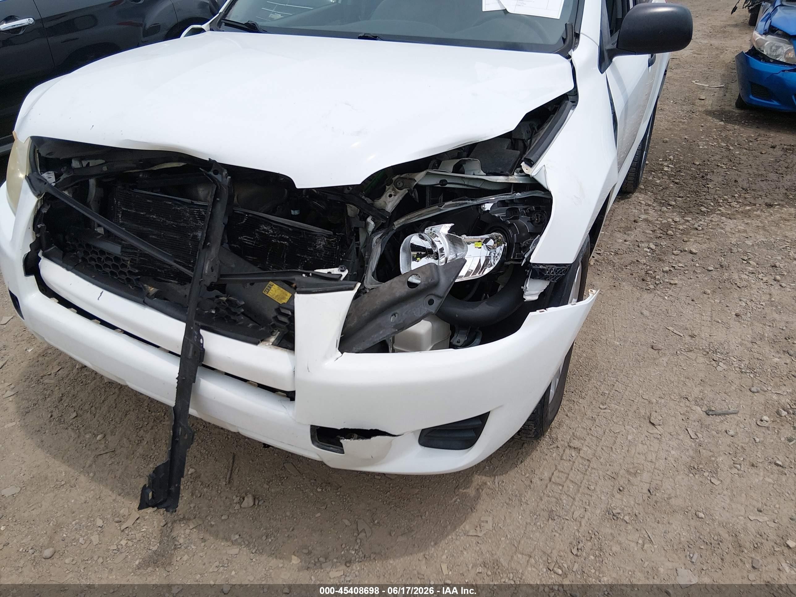 2009 Toyota Rav4   White vin: JTMBF33V19D011966