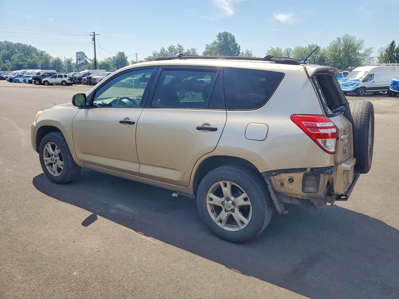 2009 Toyota Rav4 Base Tan vin: JTMBF33V19D014625
