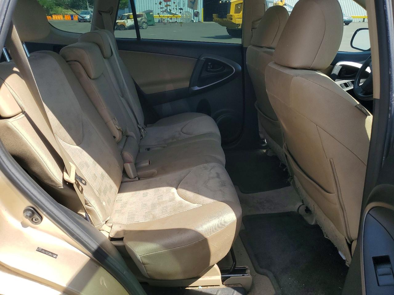 2009 Toyota Rav4 Base Tan vin: JTMBF33V19D014625