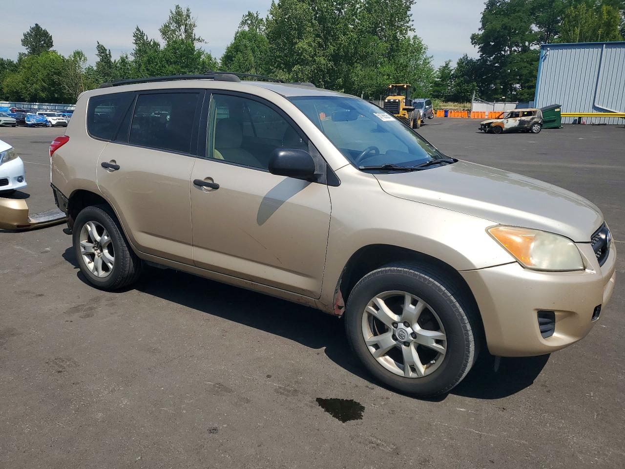 2009 Toyota Rav4 Base Tan vin: JTMBF33V19D014625