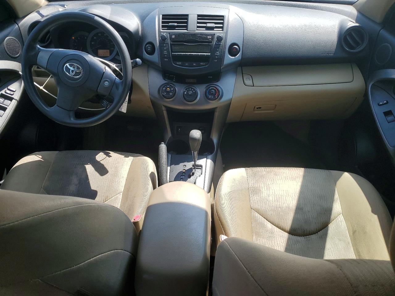 2009 Toyota Rav4 Base Tan vin: JTMBF33V19D014625