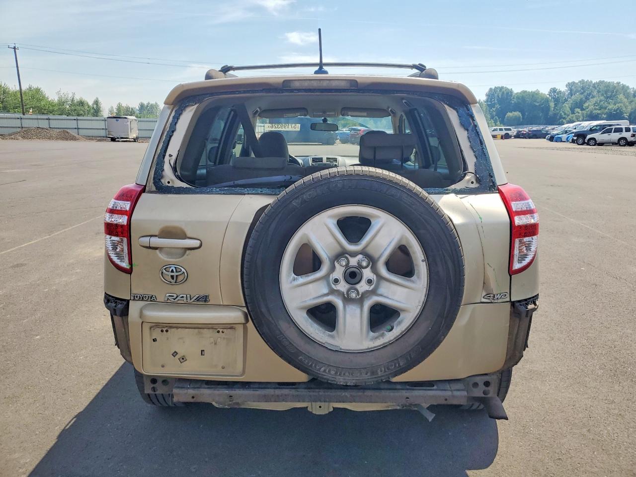 2009 Toyota Rav4 Base Tan vin: JTMBF33V19D014625