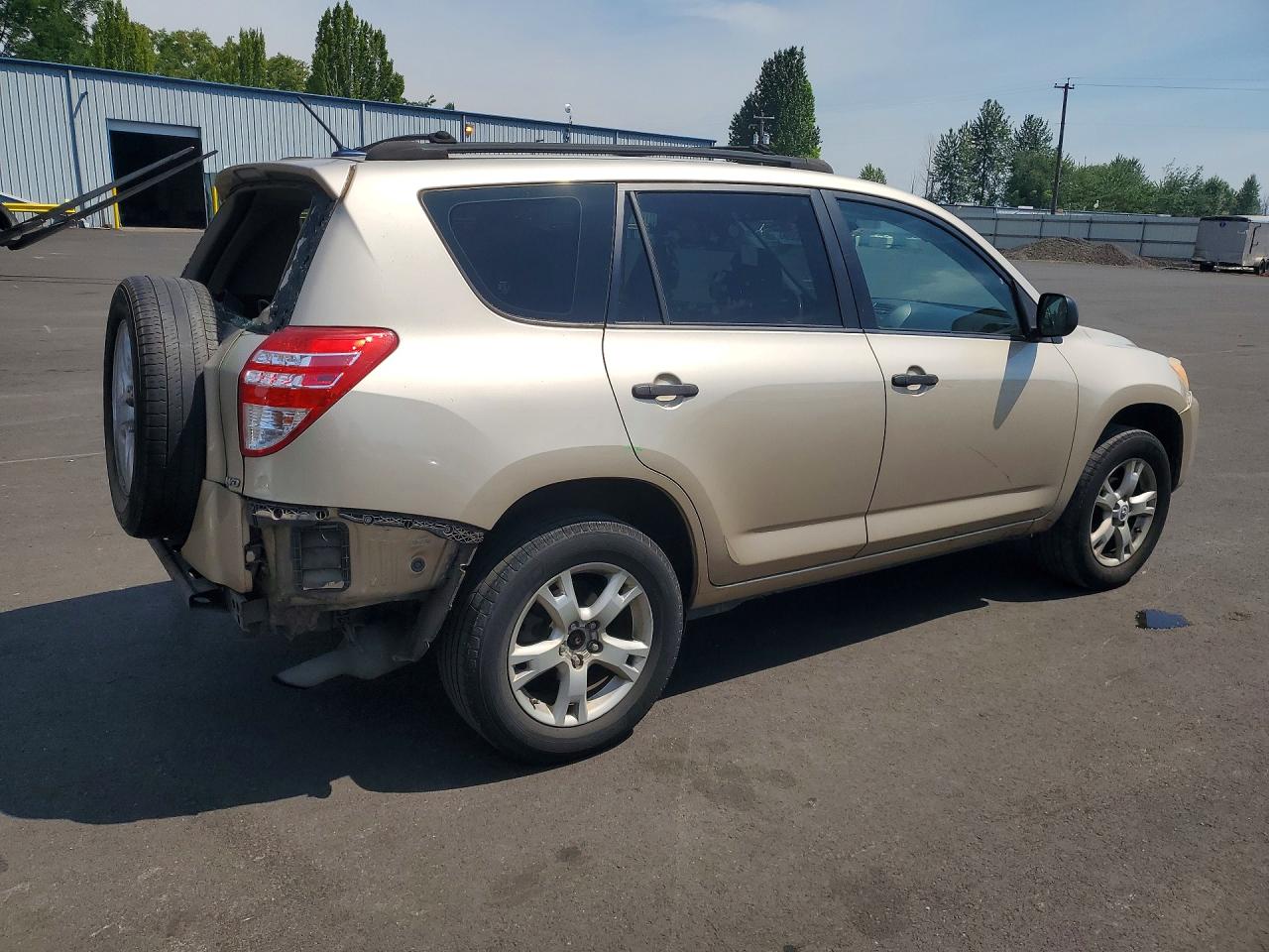 2009 Toyota Rav4 Base Tan vin: JTMBF33V19D014625