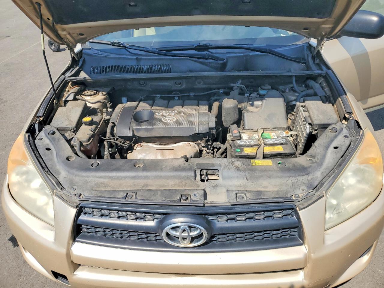 2009 Toyota Rav4 Base Tan vin: JTMBF33V19D014625