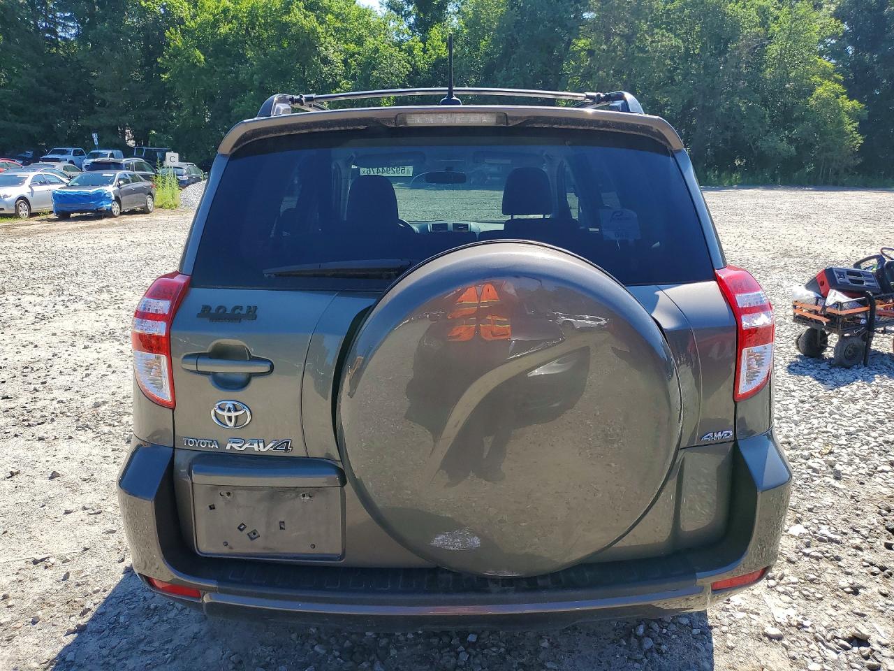 2009 Toyota Rav4 Base Gold vin: JTMBF33V495005525