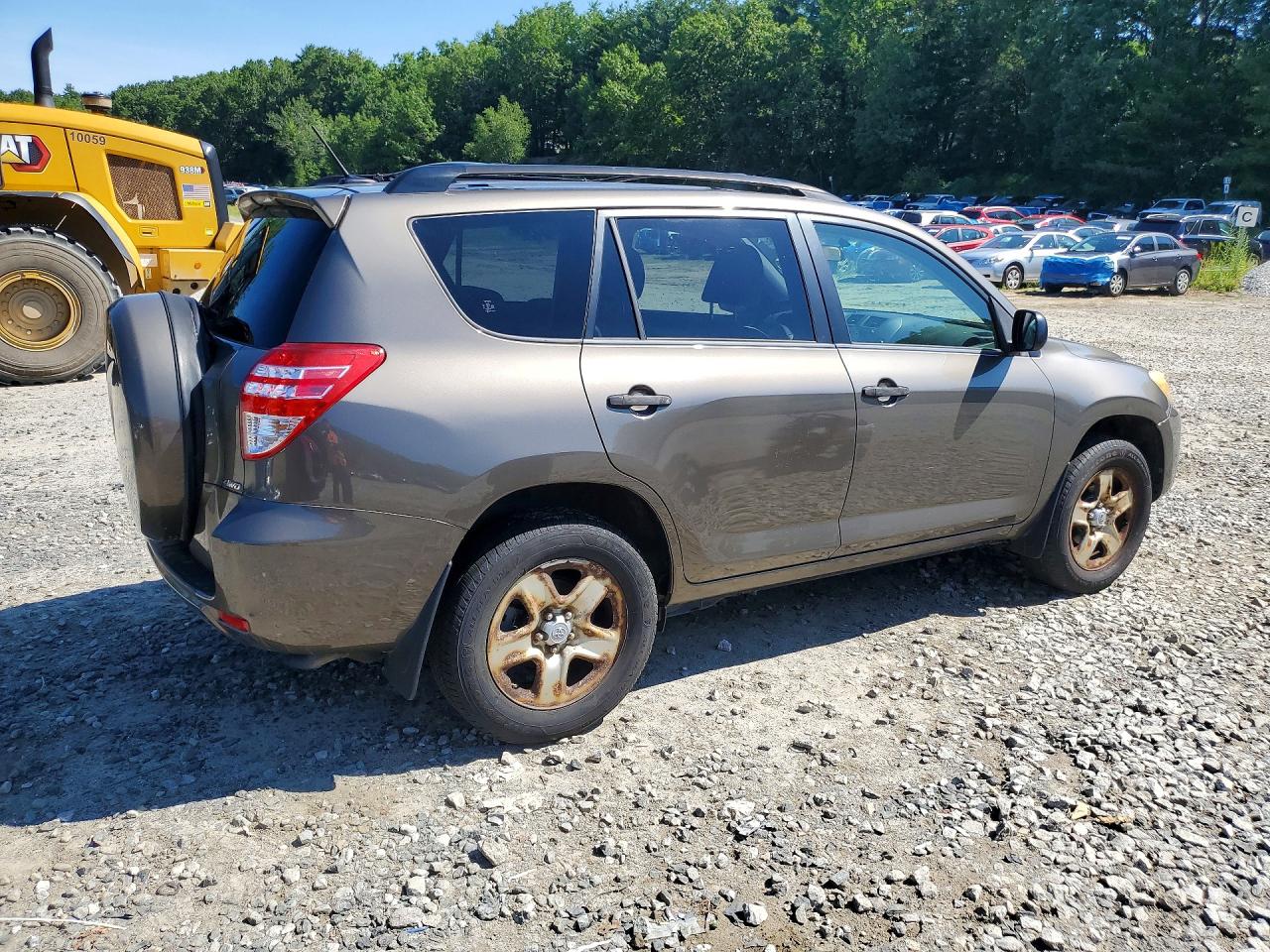 2009 Toyota Rav4 Base Gold vin: JTMBF33V495005525