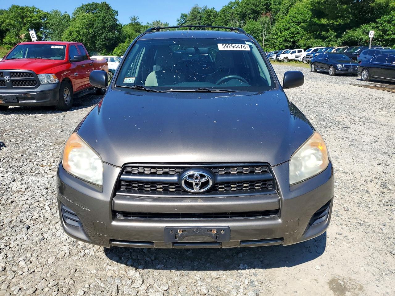 2009 Toyota Rav4 Base Gold vin: JTMBF33V495005525