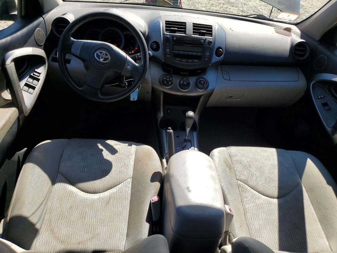 2009 Toyota Rav4 Base Gold vin: JTMBF33V495005525