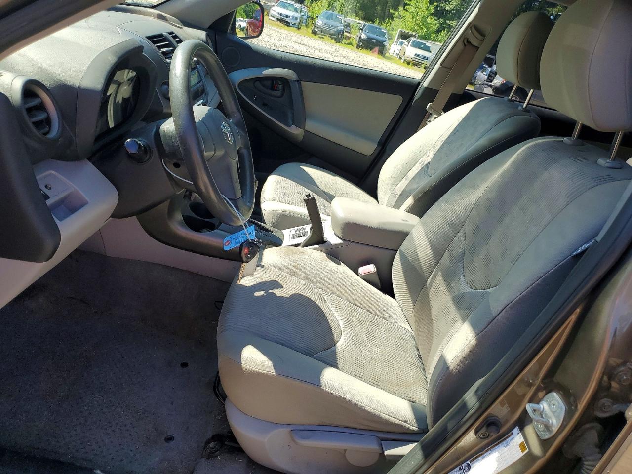 2009 Toyota Rav4 Base Gold vin: JTMBF33V495005525