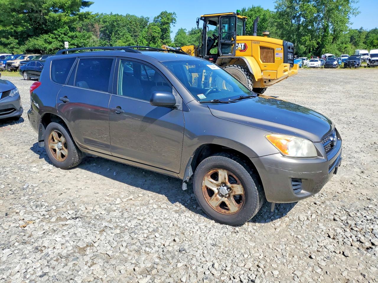 2009 Toyota Rav4 Base Gold vin: JTMBF33V495005525