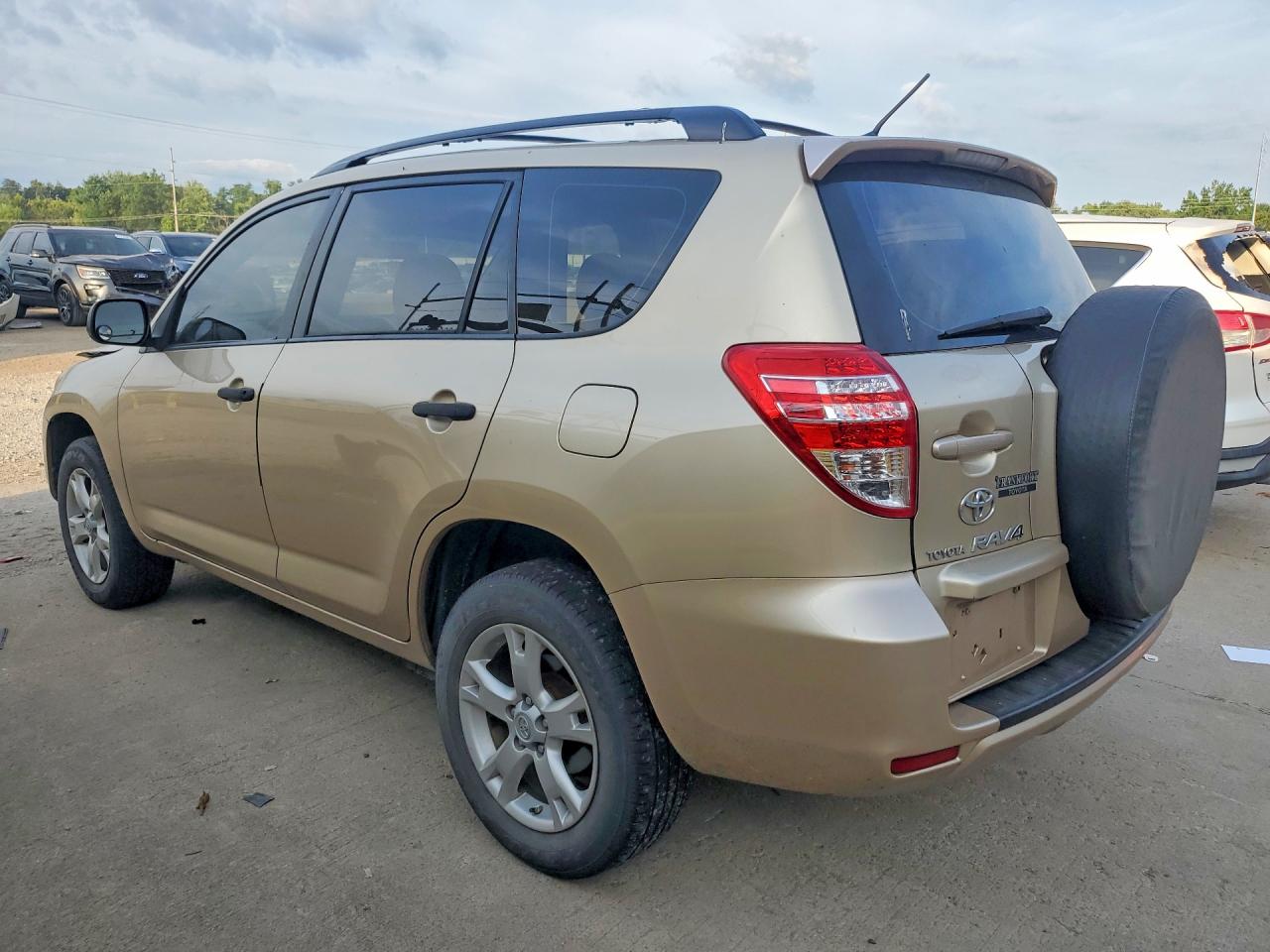 2009 Toyota Rav4 Base Gold vin: JTMBF33V495007694