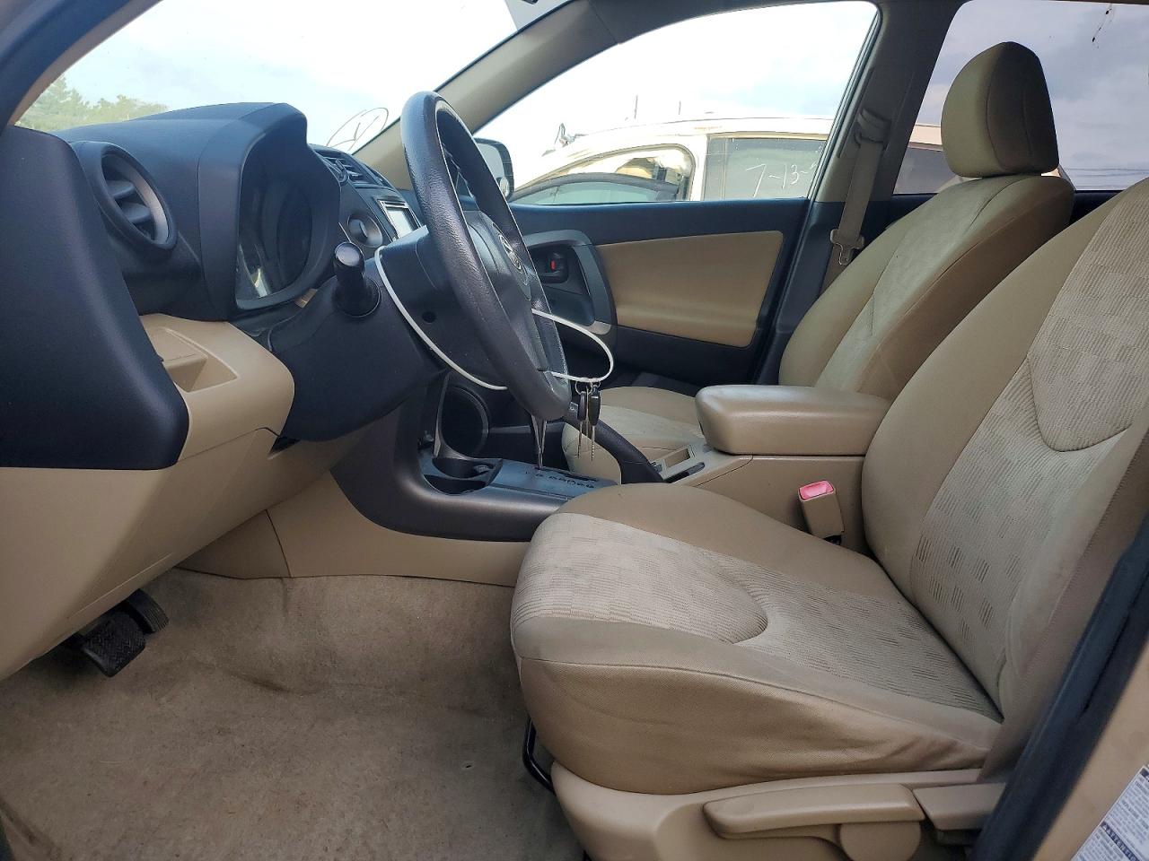 2009 Toyota Rav4 Base Gold vin: JTMBF33V495007694