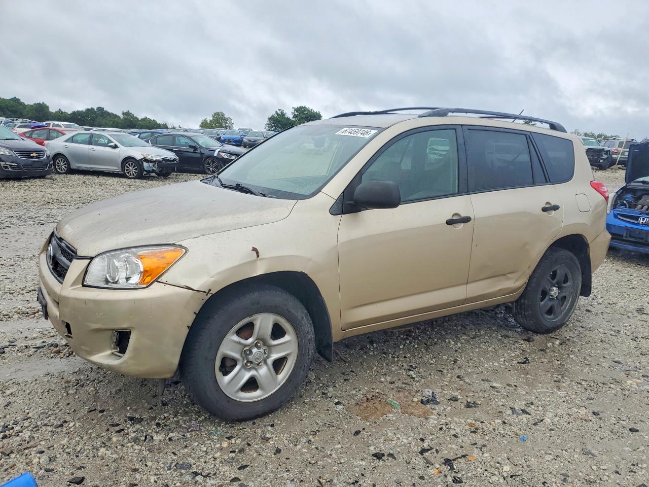 2009 Toyota Rav4 Base Tan vin: JTMBF33V495013575