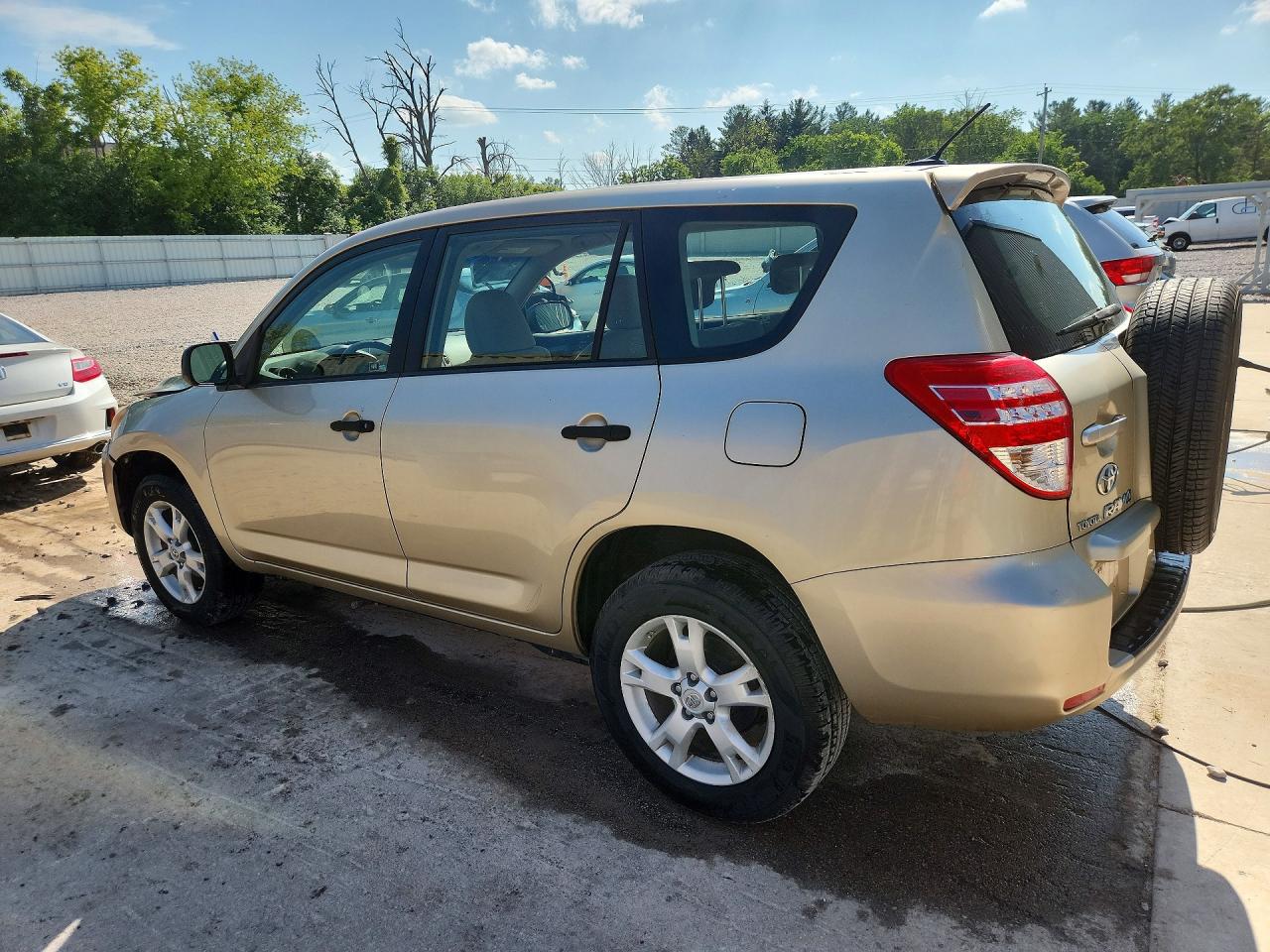 2009 Toyota Rav4 Base Beige vin: JTMBF33V49D012500
