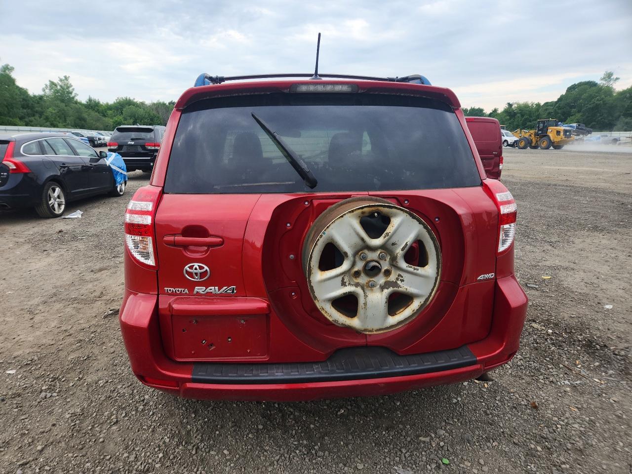 2009 Toyota Rav4 Base Red vin: JTMBF33V595013049
