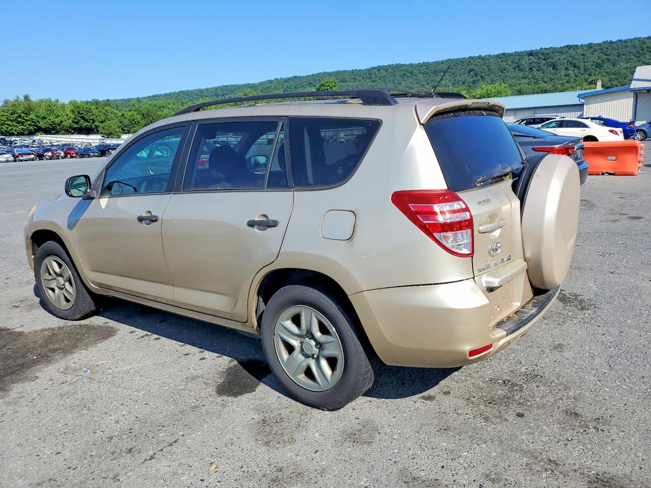 2009 Toyota Rav4 Base Желто-коричневый vin: JTMBF33V79D017478