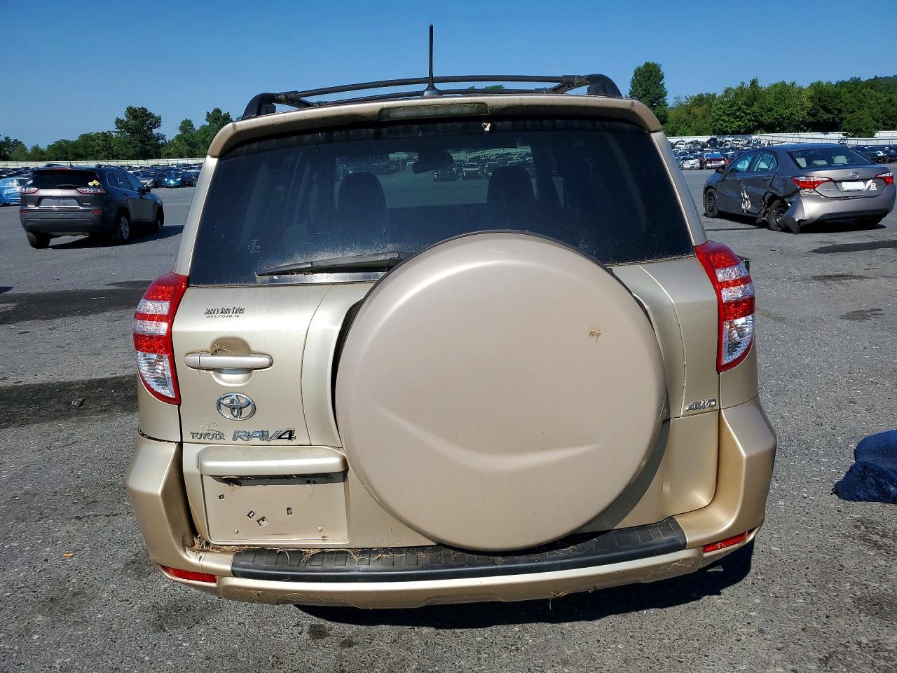2009 Toyota Rav4 Base Желто-коричневый vin: JTMBF33V79D017478