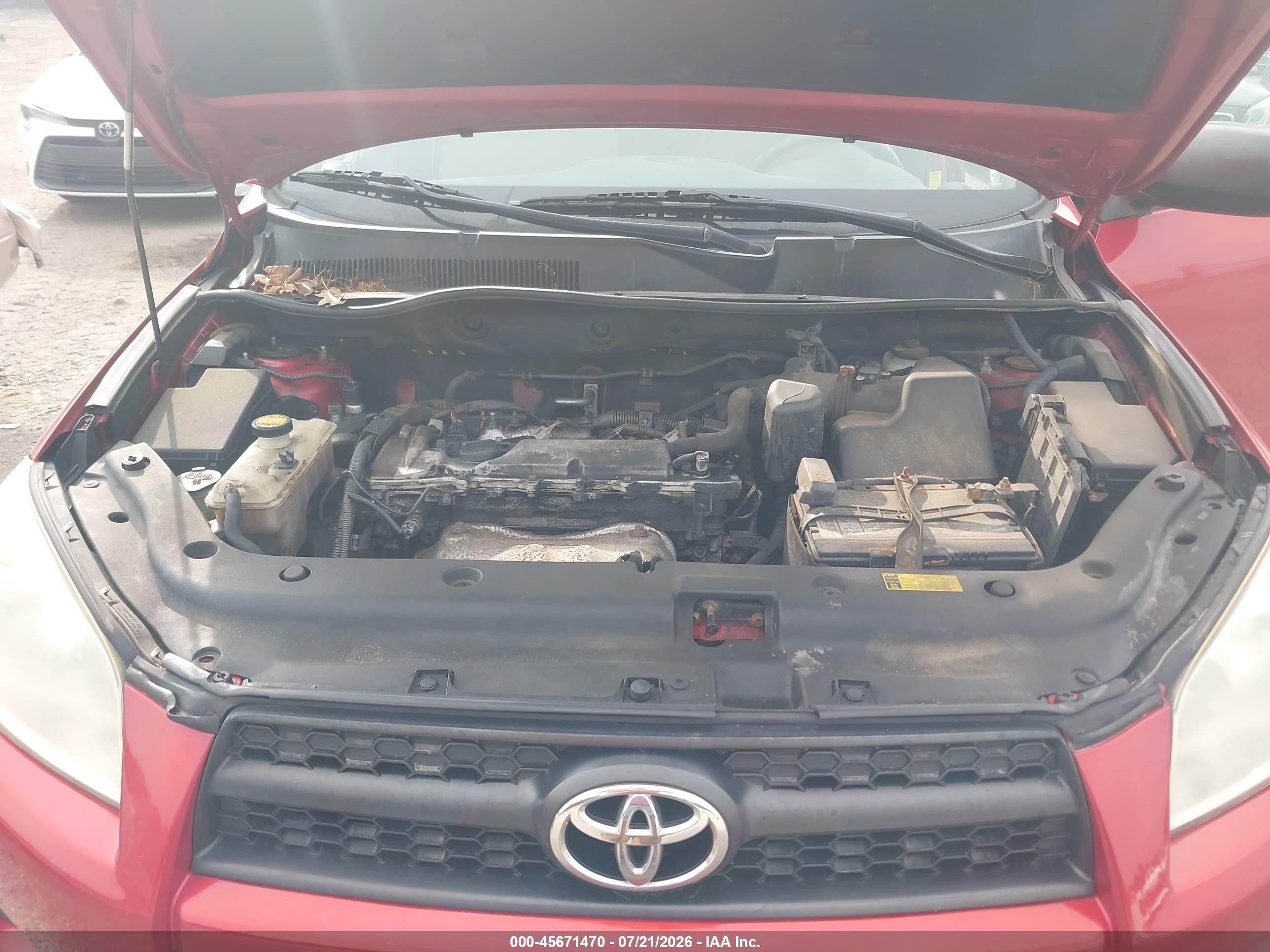 2009 Toyota Rav4   Red vin: JTMBF33V79D017867
