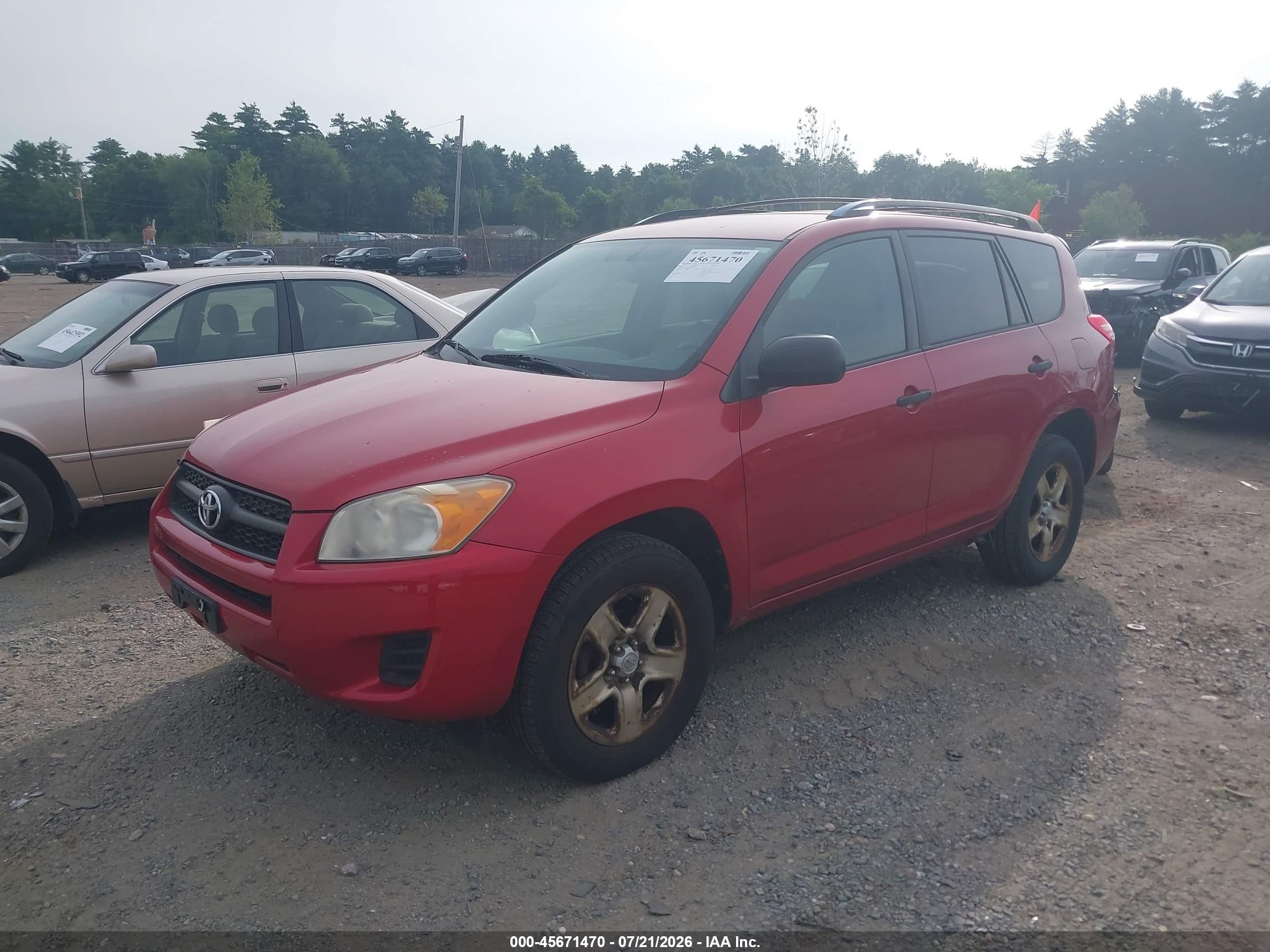 2009 Toyota Rav4   Red vin: JTMBF33V79D017867