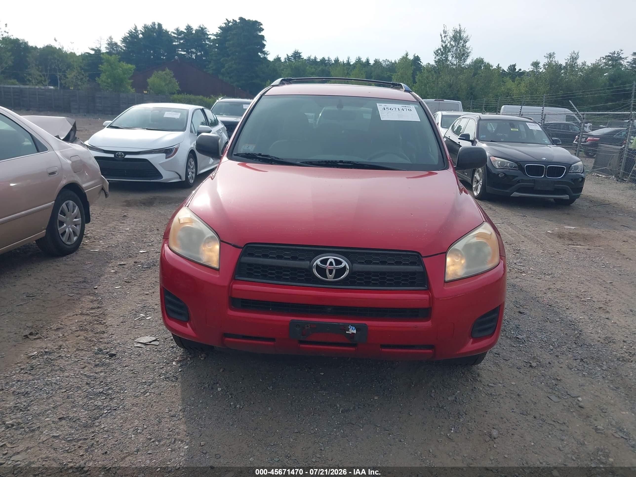 2009 Toyota Rav4   Red vin: JTMBF33V79D017867