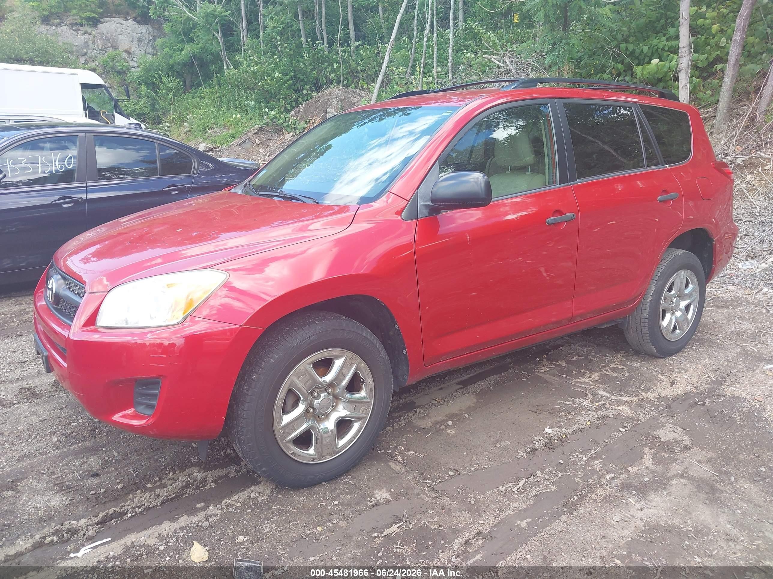 2009 Toyota Rav4   Red vin: JTMBF33V995010557