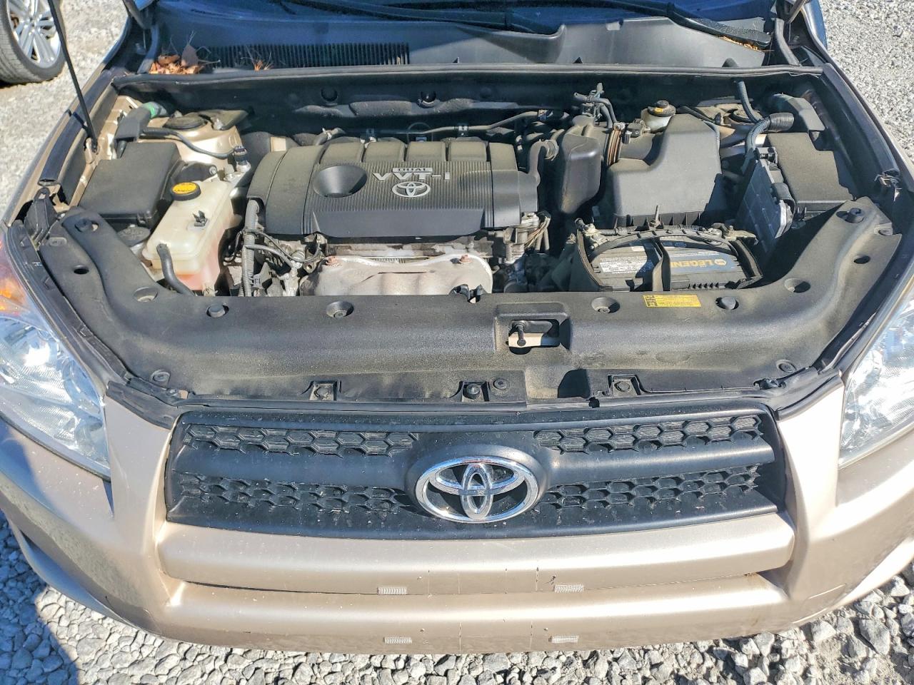2009 Toyota Rav4 Base Gold vin: JTMBF33VX95014150