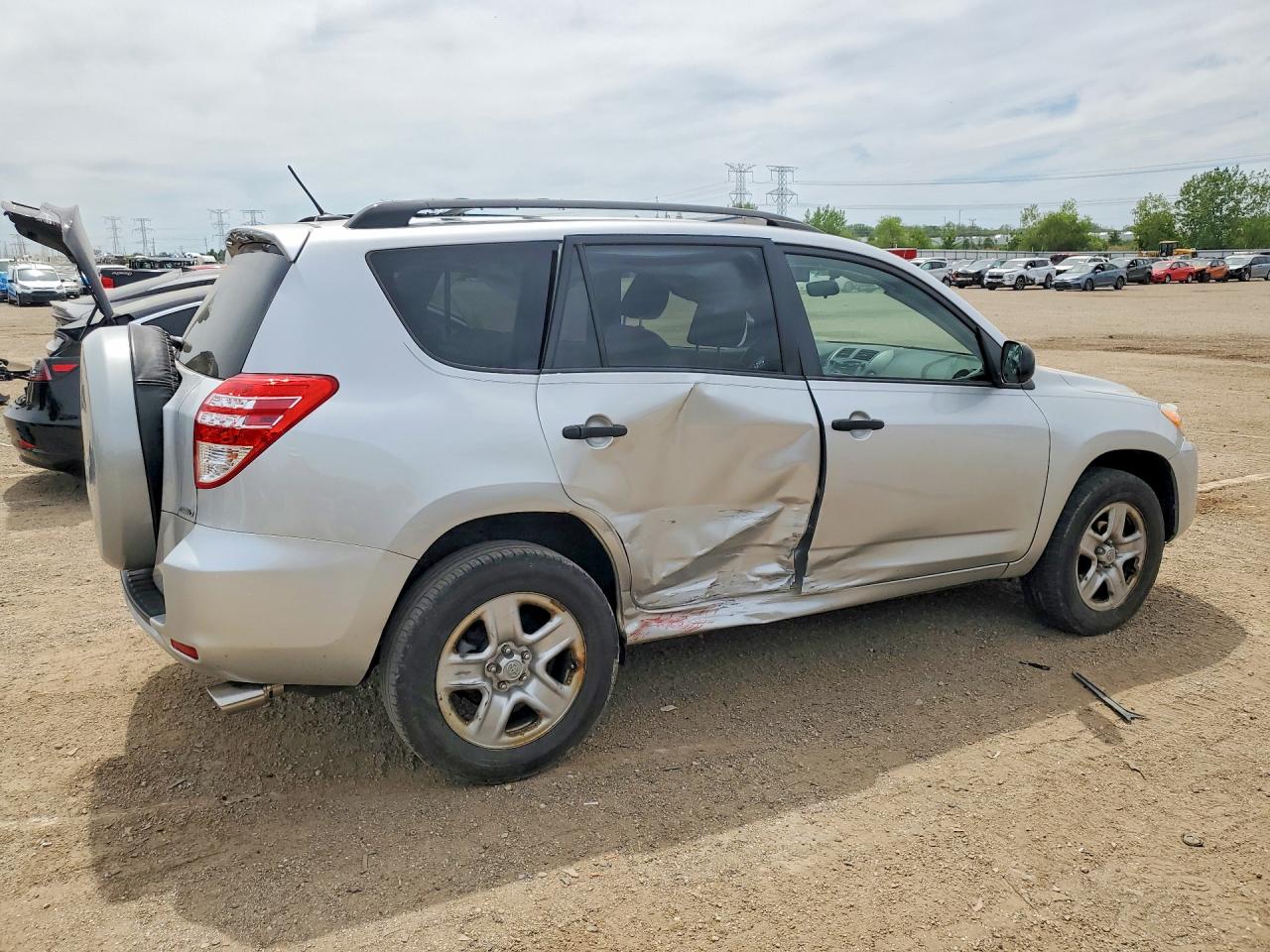 2010 Toyota Rav4 Base Серебряный vin: JTMBF4DV0AD038407