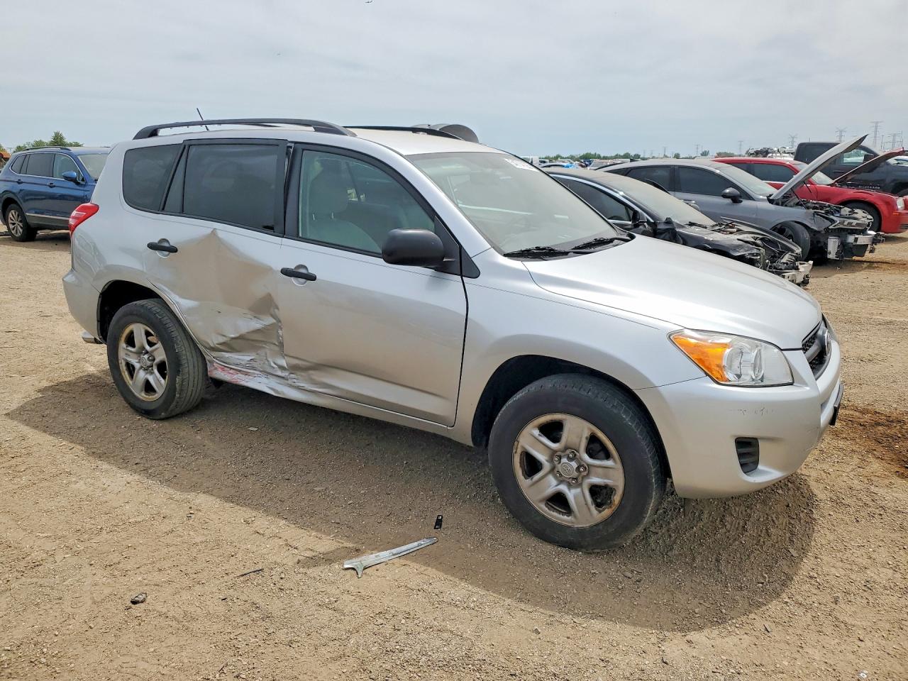 2010 Toyota Rav4 Base Серебряный vin: JTMBF4DV0AD038407