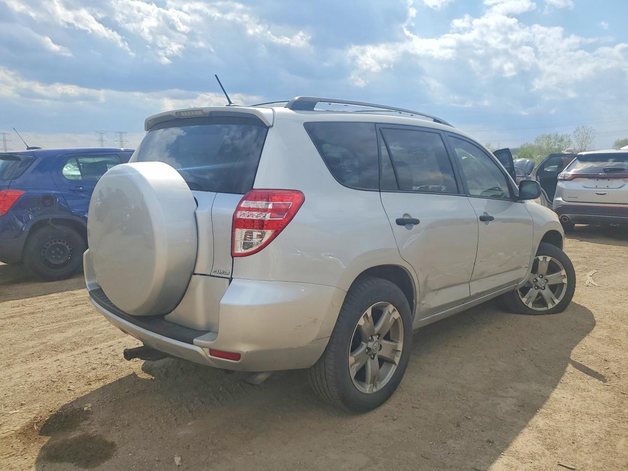 2010 Toyota Rav4 Base Silver vin: JTMBF4DV1AD037539