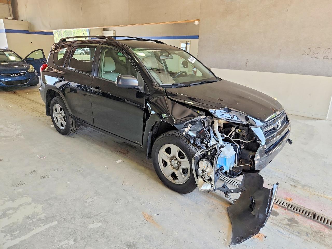 2010 Toyota Rav4 Base Black vin: JTMBF4DV2A5033073
