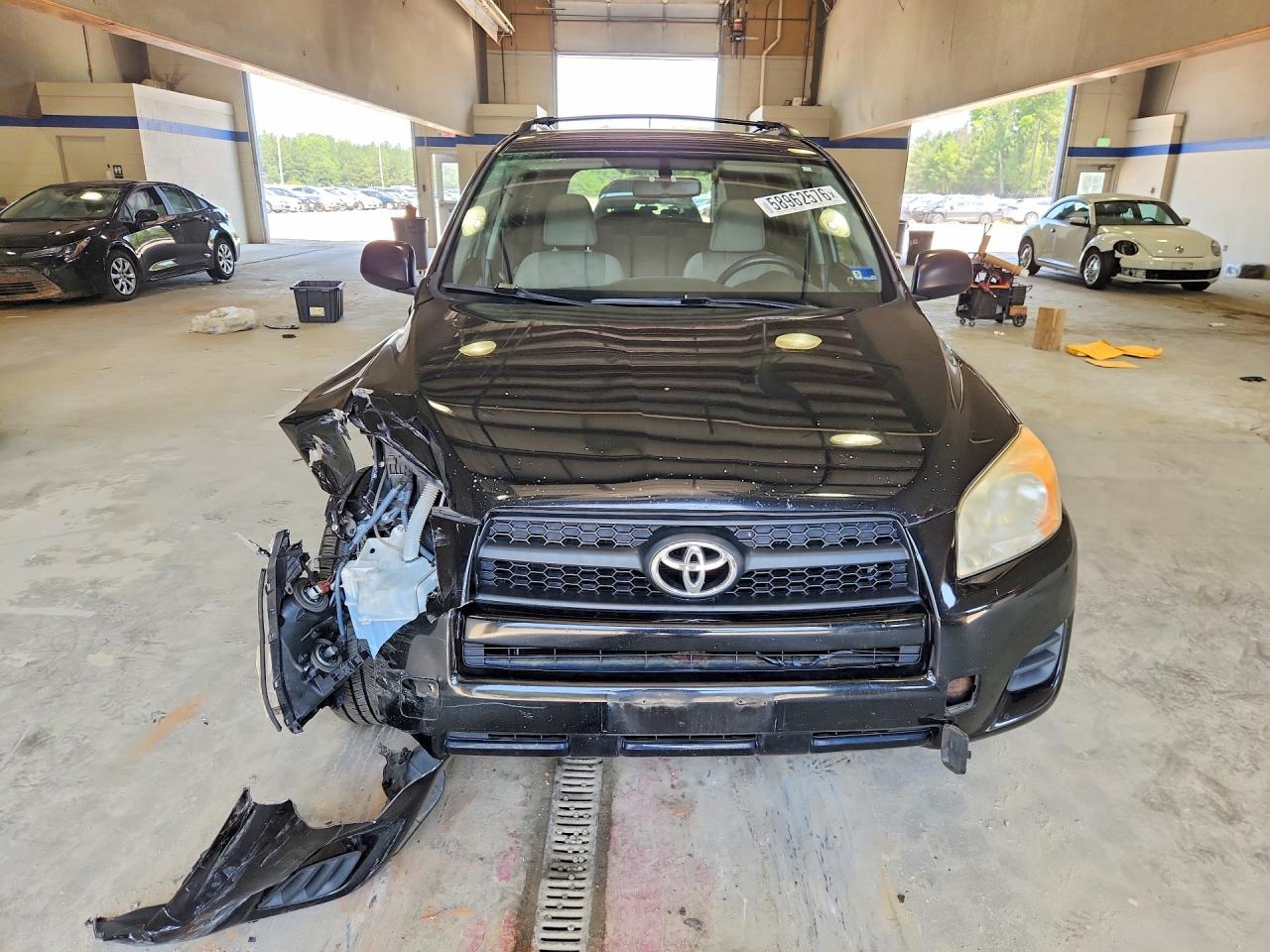 2010 Toyota Rav4 Base Black vin: JTMBF4DV2A5033073