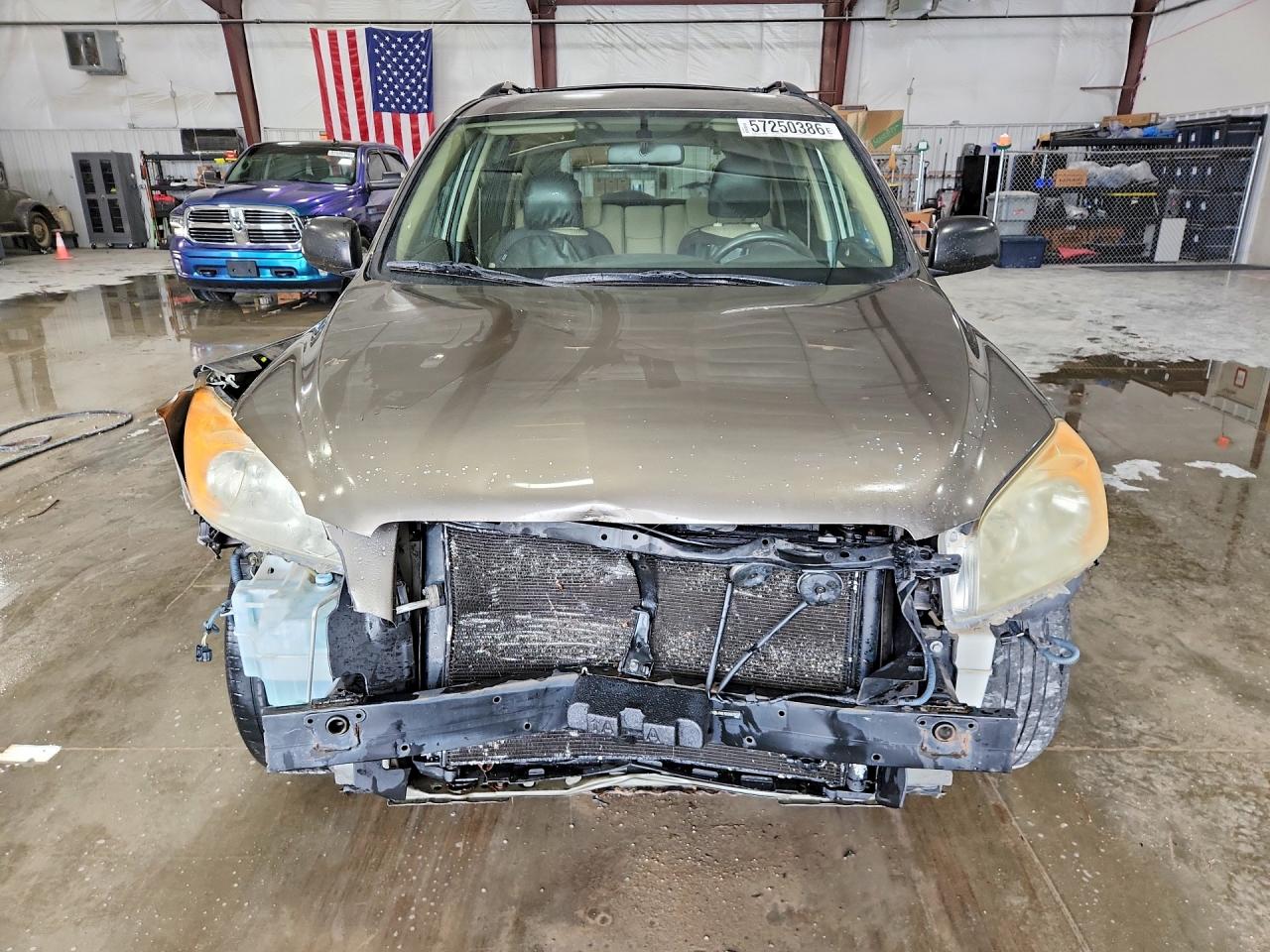 2010 Toyota Rav4 Base Tan vin: JTMBF4DV2AD035007