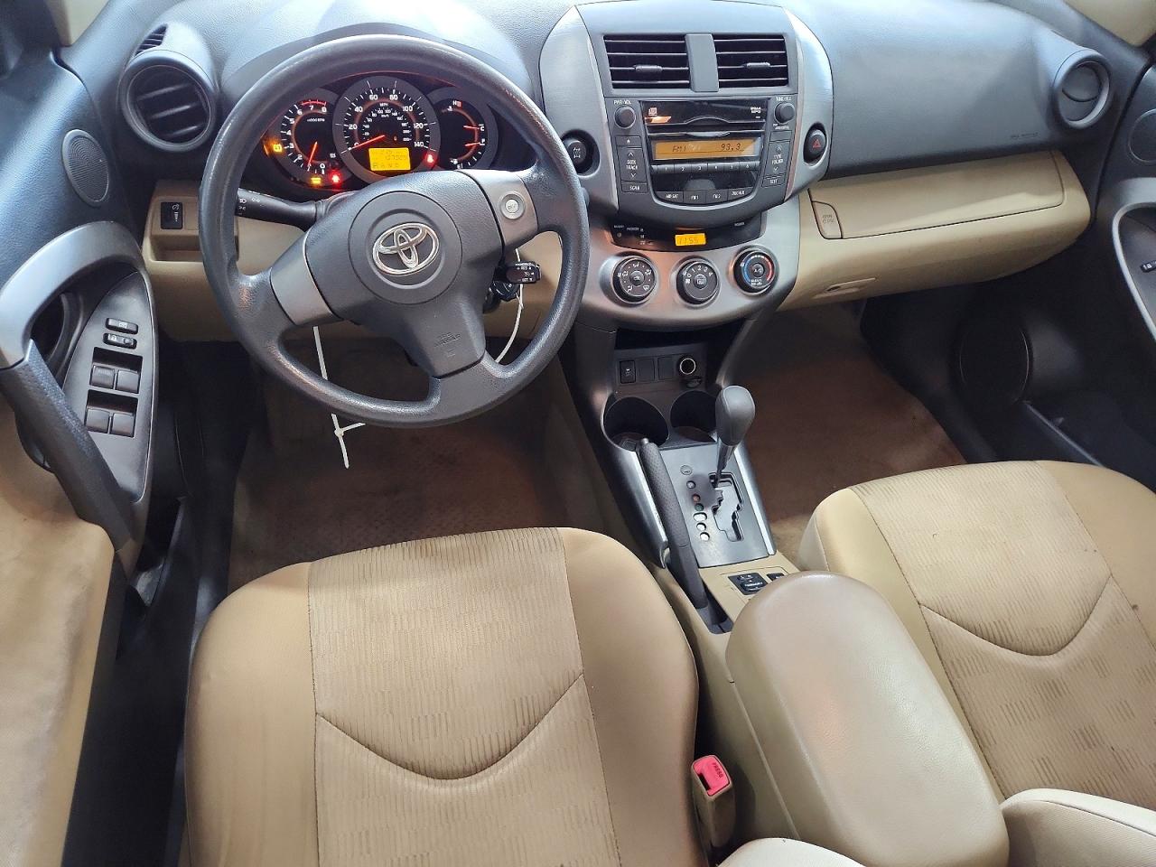 2010 Toyota Rav4 Base Tan vin: JTMBF4DV2AD035007