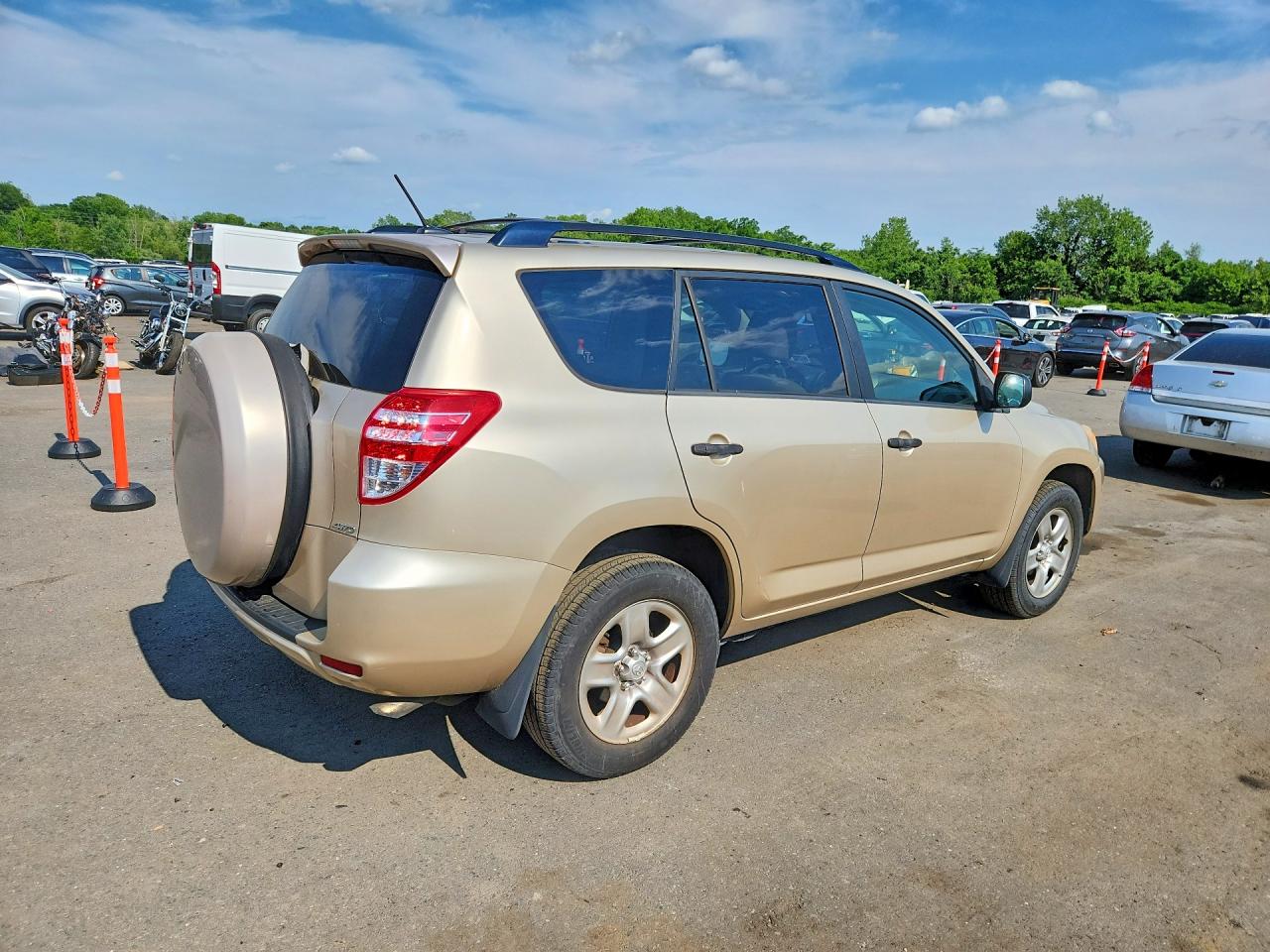 2010 Toyota Rav4 Base Gold vin: JTMBF4DV4A5021202