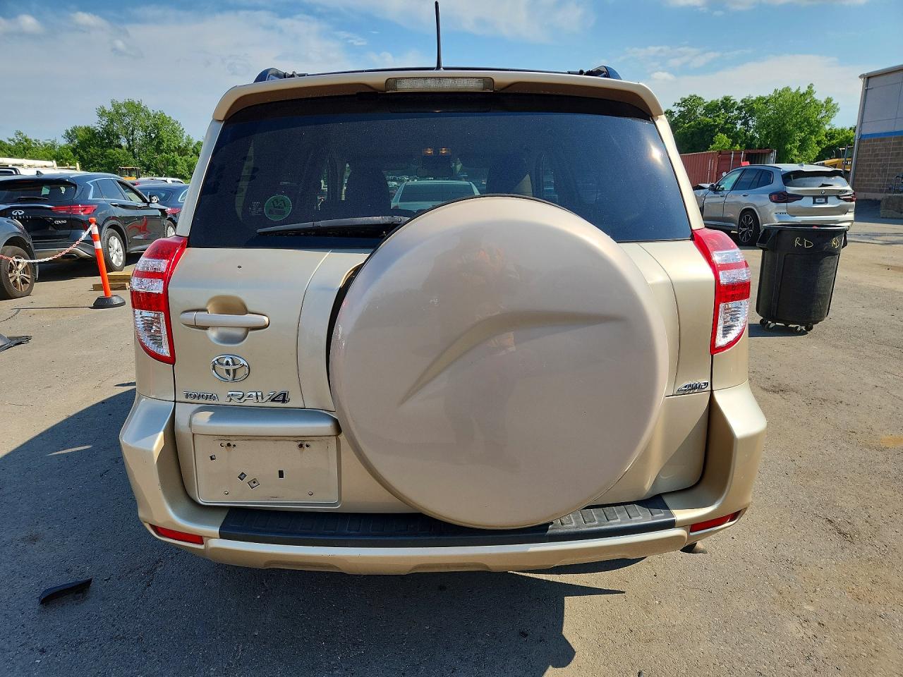 2010 Toyota Rav4 Base Gold vin: JTMBF4DV4A5021202
