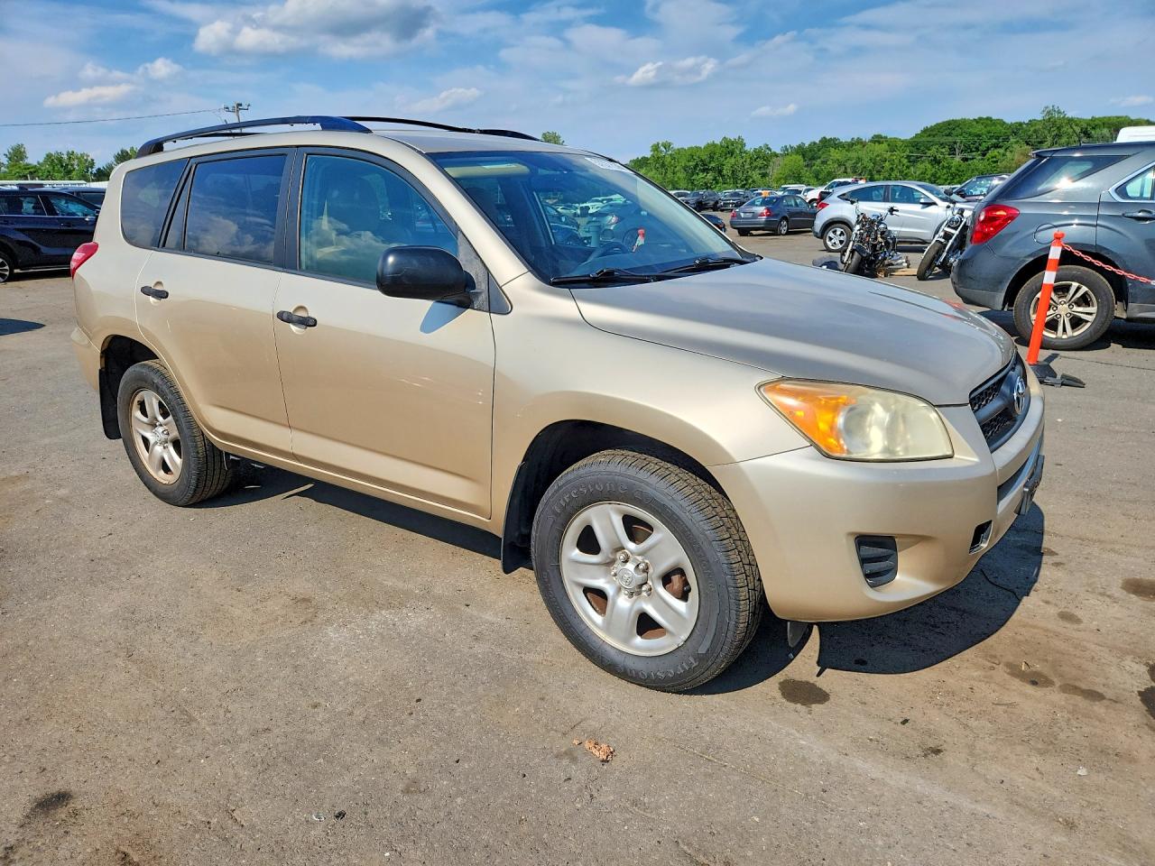 2010 Toyota Rav4 Base Gold vin: JTMBF4DV4A5021202