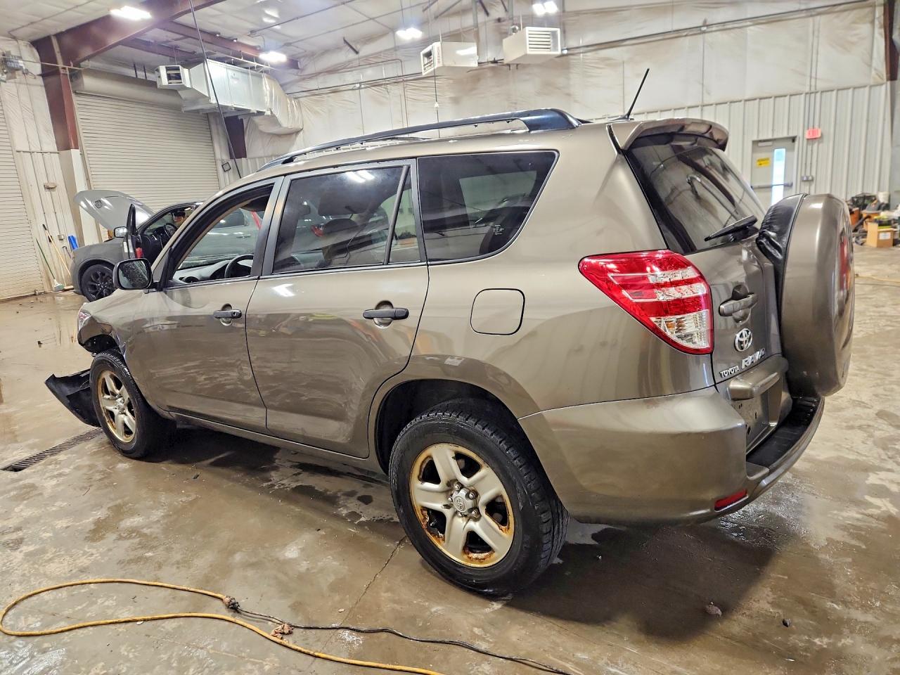 2010 Toyota Rav4 Base Brown vin: JTMBF4DV6AD027590