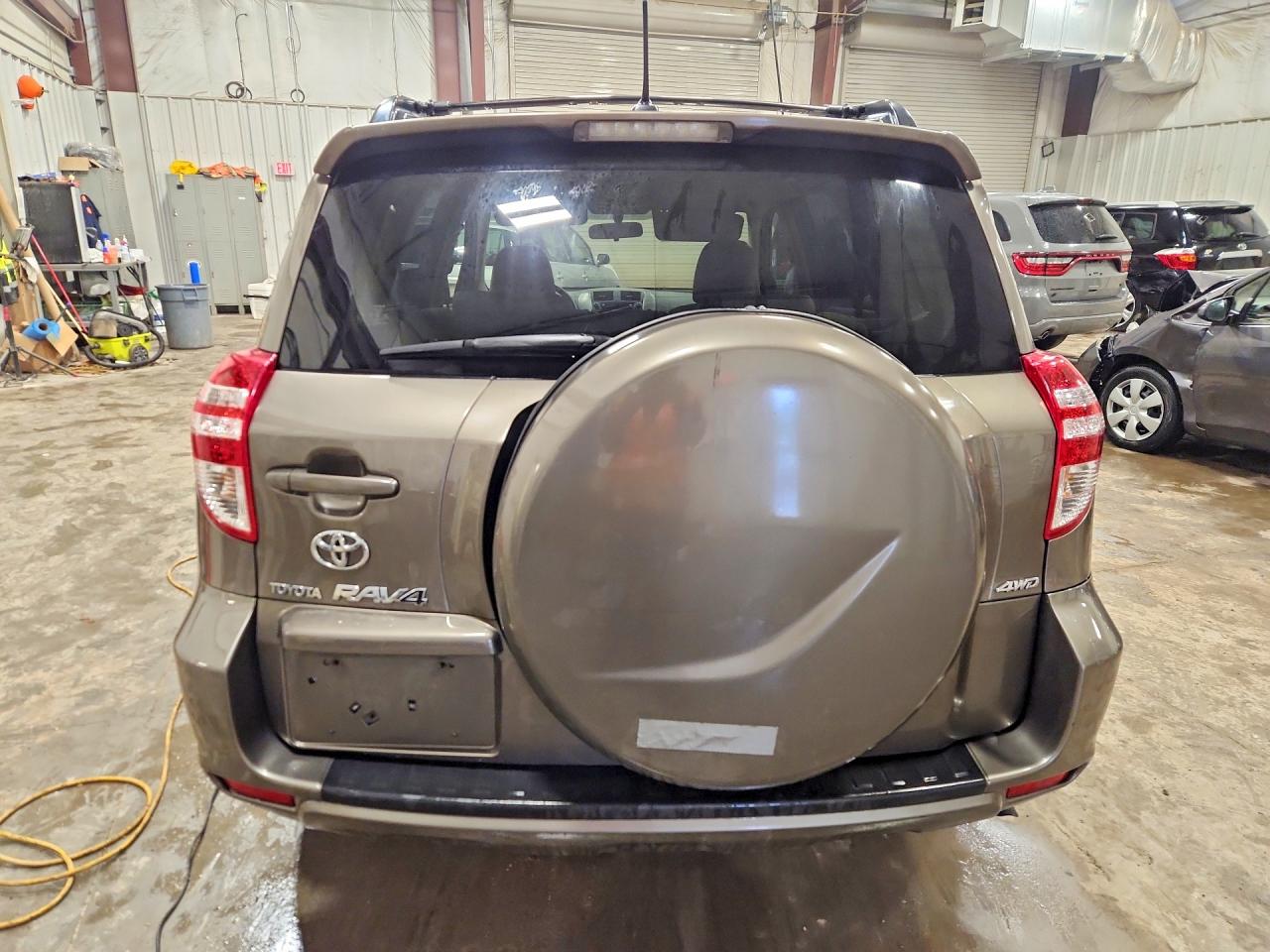 2010 Toyota Rav4 Base Brown vin: JTMBF4DV6AD027590